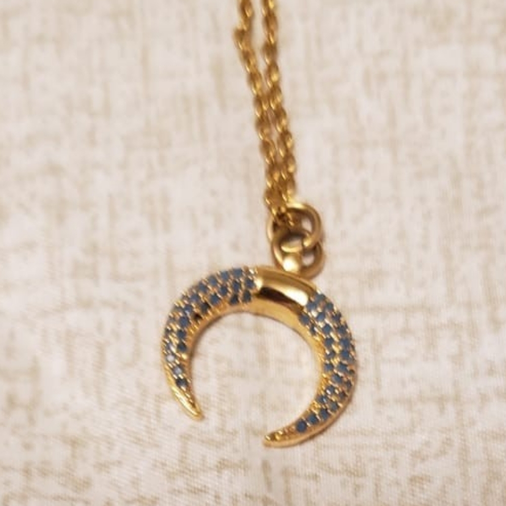 Gold plated horn with turquoise little stones